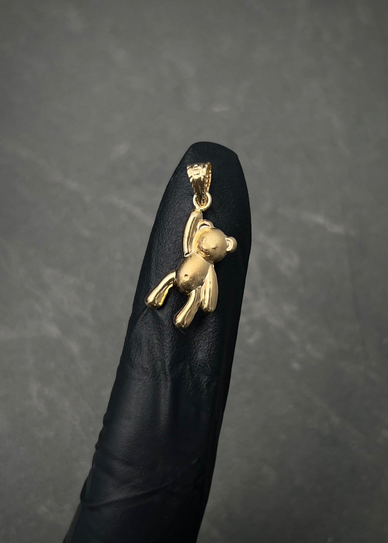 Dije oso 0.65gr / Largo 2.3cm / Oro Amarillo Nac M