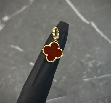 Dije lucky clover piedra roja 1.95gr / Largo 2.5 cm / Oro Amarillo Nac P