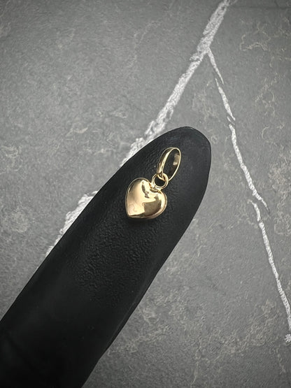 Dije de corazon liso 0.35gr / Largo 1.1cm / Oro Amarillo Nac P