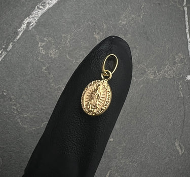 Dije de virgen de guadalupe 0.35gr / 1.5cm / Oro Amarillo Nac B
