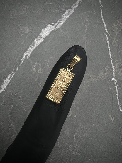 Dije dolar 0.8gr / Largo 2.3cm — Oro Amarillo