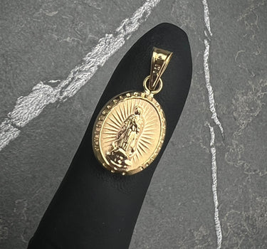 Dije virgen de guadalupe 0.85gr / Largo 2.4cm / Oro Amarillo Nac B