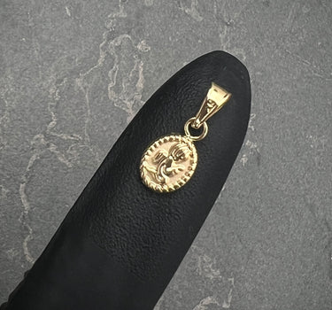 Dije angel de la guarda 0.35gr / Largo 1.5cm / Oro Amarillo Nac B