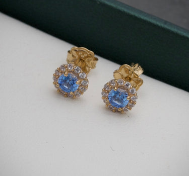 Topos con swarovski azul turquesa y blanco 3gr / 1.5cm / Oro Amarillo Nac P