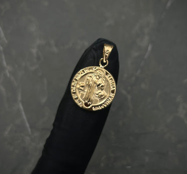 Dije san benito 0.85gr / Largo 2.2cm / Oro Amarillo Nac B