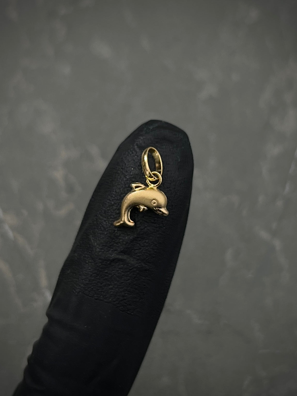 Dije de delfin 0.3gr / Largo 1.5cm / Oro Amarillo Nac *