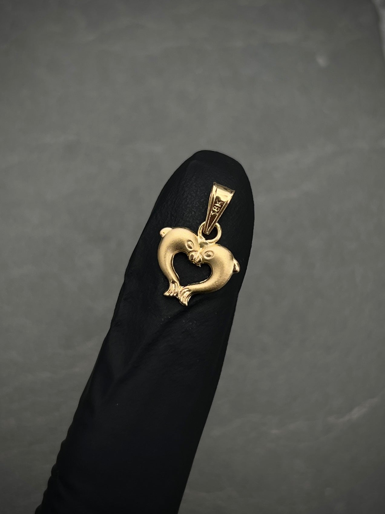 Dije de delfin 0.4gr / Largo 1.5cm / Oro Amarillo Nac *