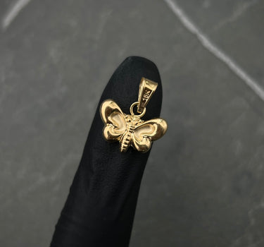 Dije de mariposa 0.75gr / Largo 1.7cm / Oro Amarillo Nac P