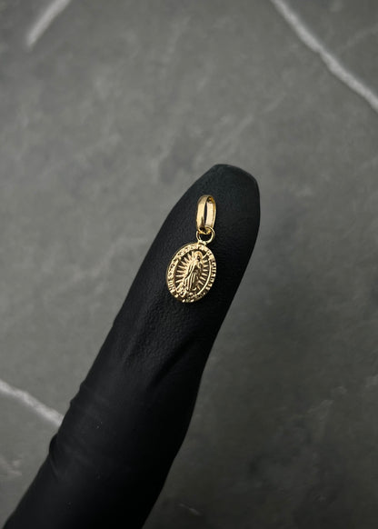 Dije virgen de guadalupe. 0.35gr / Largo 1.5cm / Oro Amarillo Nac P