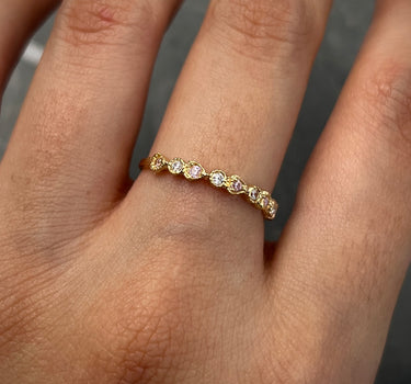 Anillo con swarovski rosado y blanco 1.2gr / Talla: 6 1/2 / Oro Amarillo Nac B