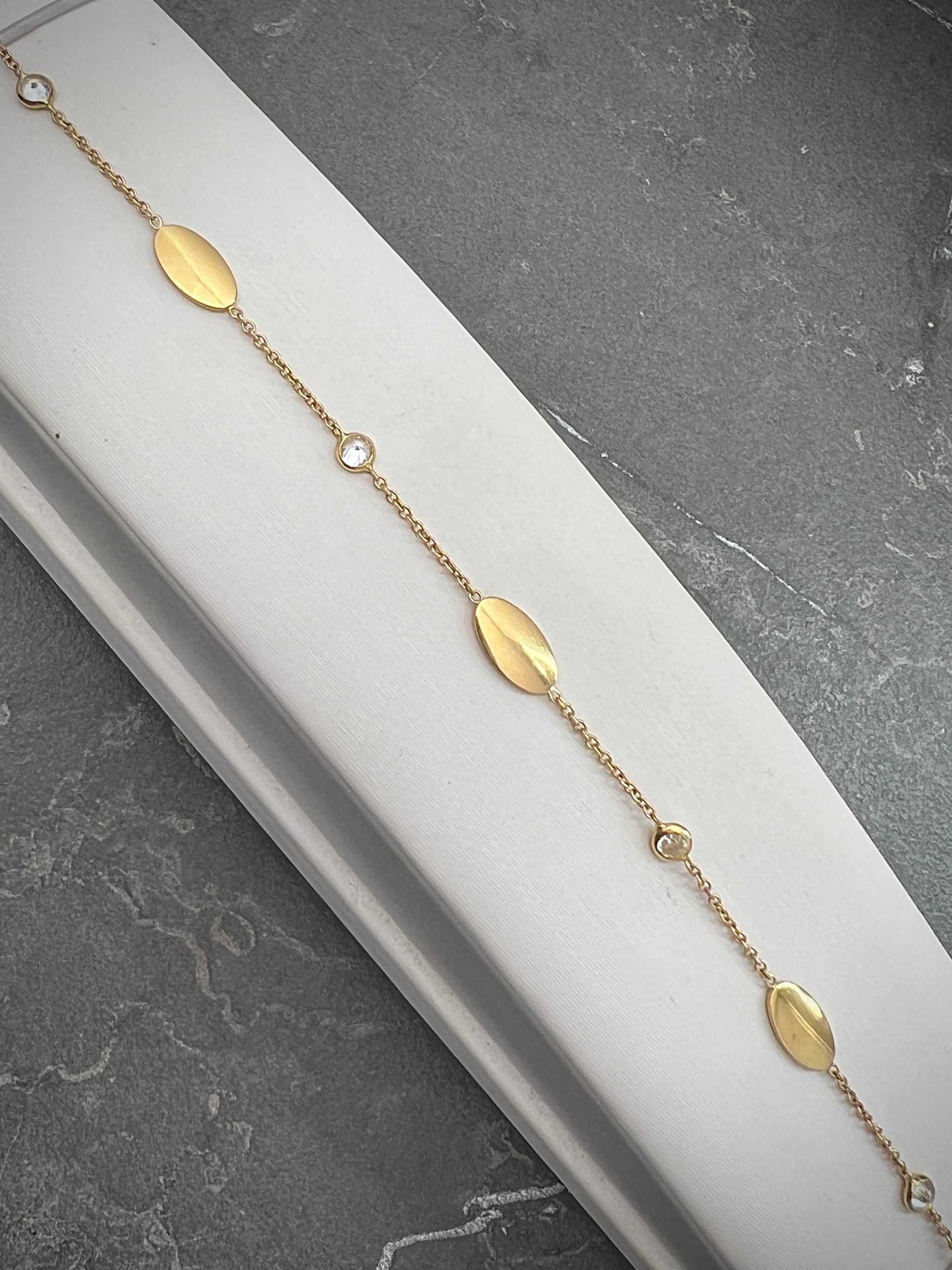 Pulso tejido rolon con swarovski blanco y placas 2.5gr / Oro Amarillo italy cte M