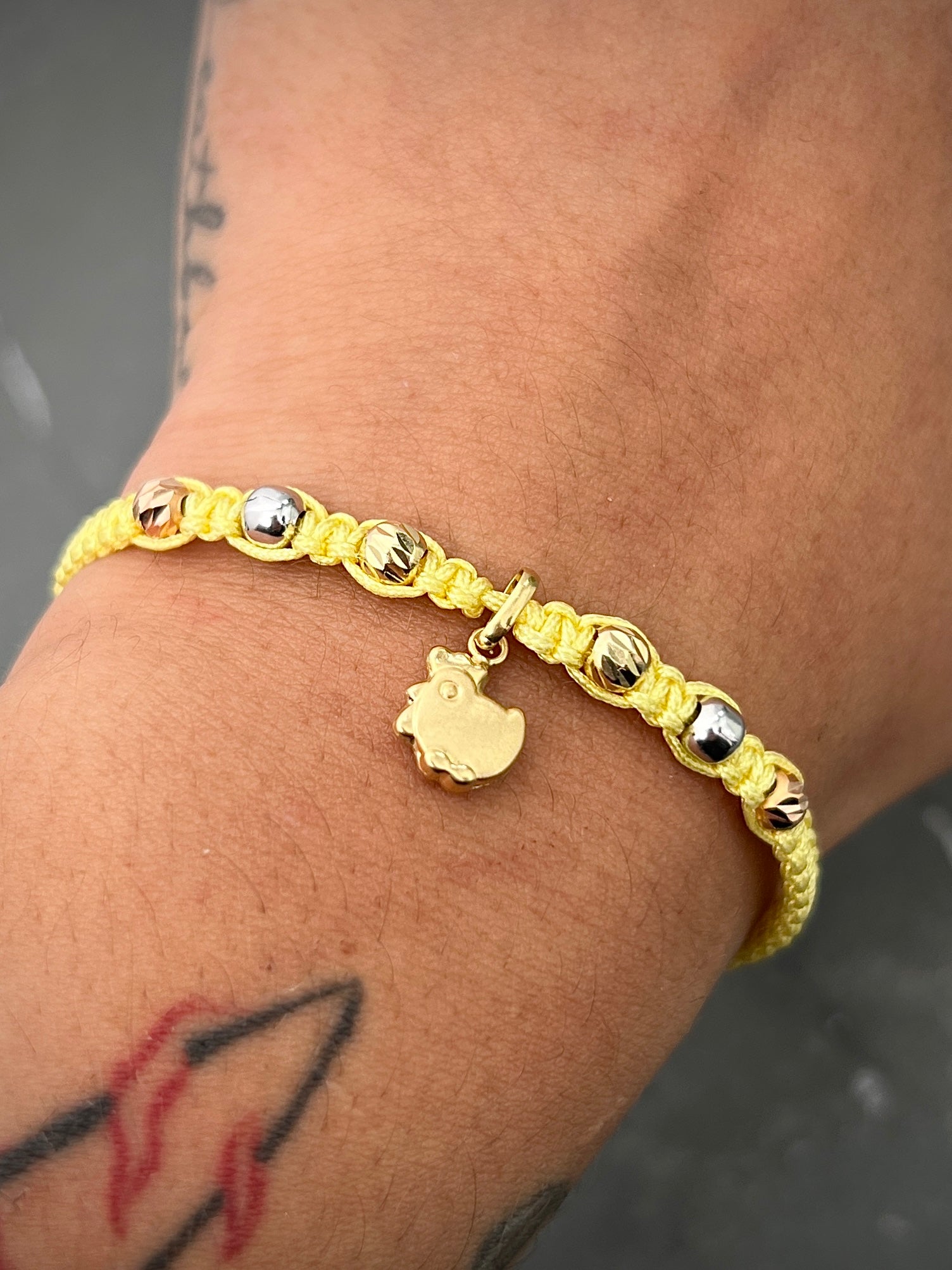 Pulsera en hilo amarillo 1gr / Tres Oros (Joya) M