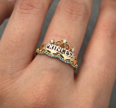 Anillo corona con swarovski blanco y azul 2.35gr / TALLA 6 1/2 / Oro Amarillo Nac M