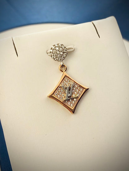 Dije de LV 3.05gr / 3cm / Dos Oros Nac B