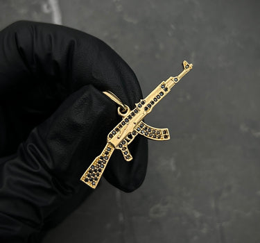 Dije DE FUsil COn Swarovski NEgro 3.4gr / Largo 2.0cm / Oro Amarillo Nac B