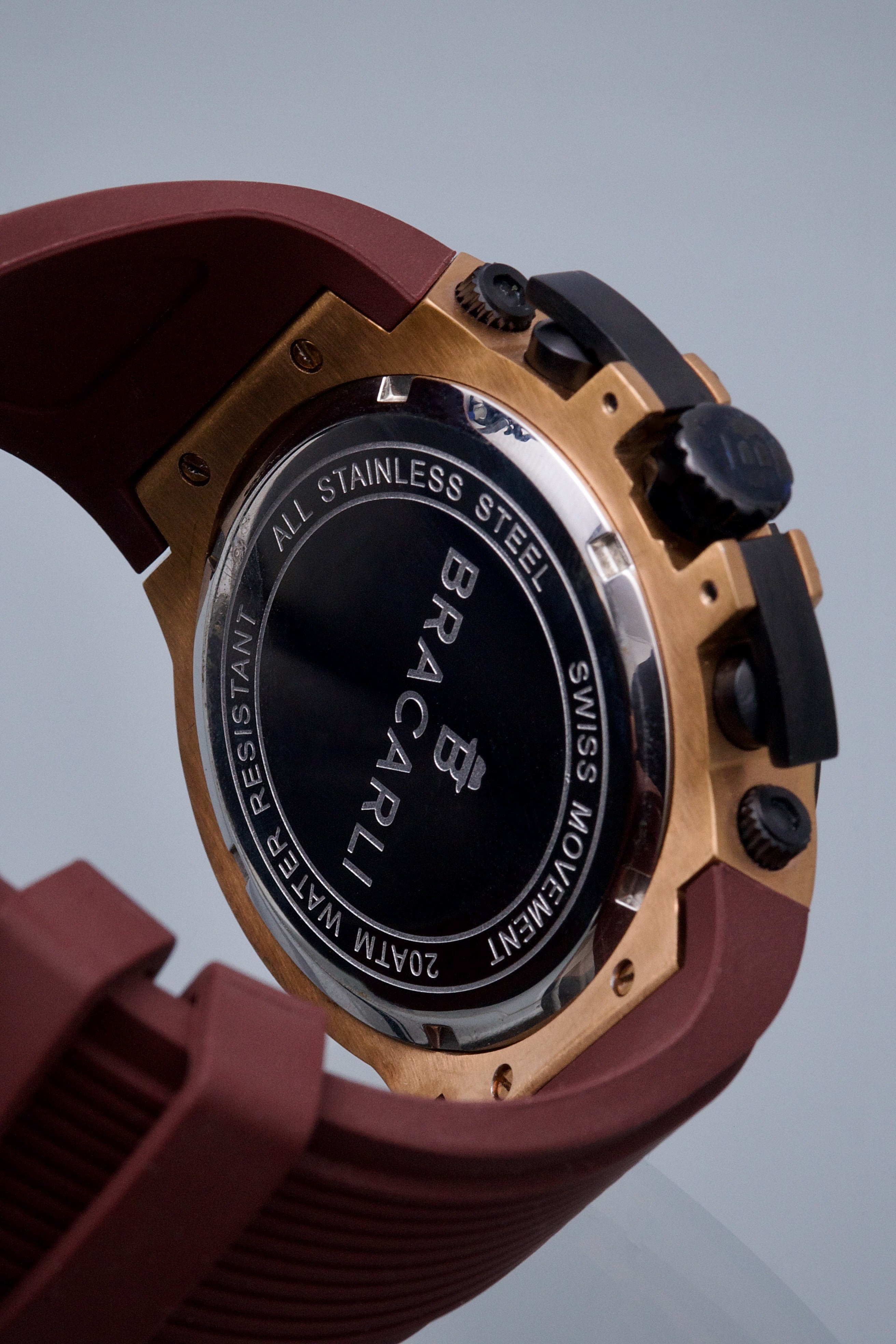 Reloj Bracarli Metal I. Caja rosa y negro. Fondo blanco y Correa cafe*