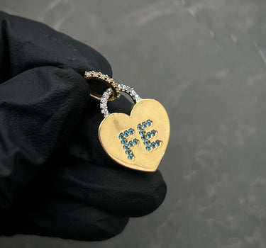 Dije de corazon con swarovski azul en "fe" 2.35gr / 2.5cm / Oro Amarillo Nac M