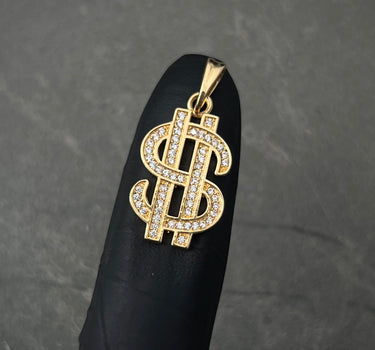 Dije signo peso con swarovski blanco 3.2gr / Largo 2.7cm / Oro Amarillo Nac B