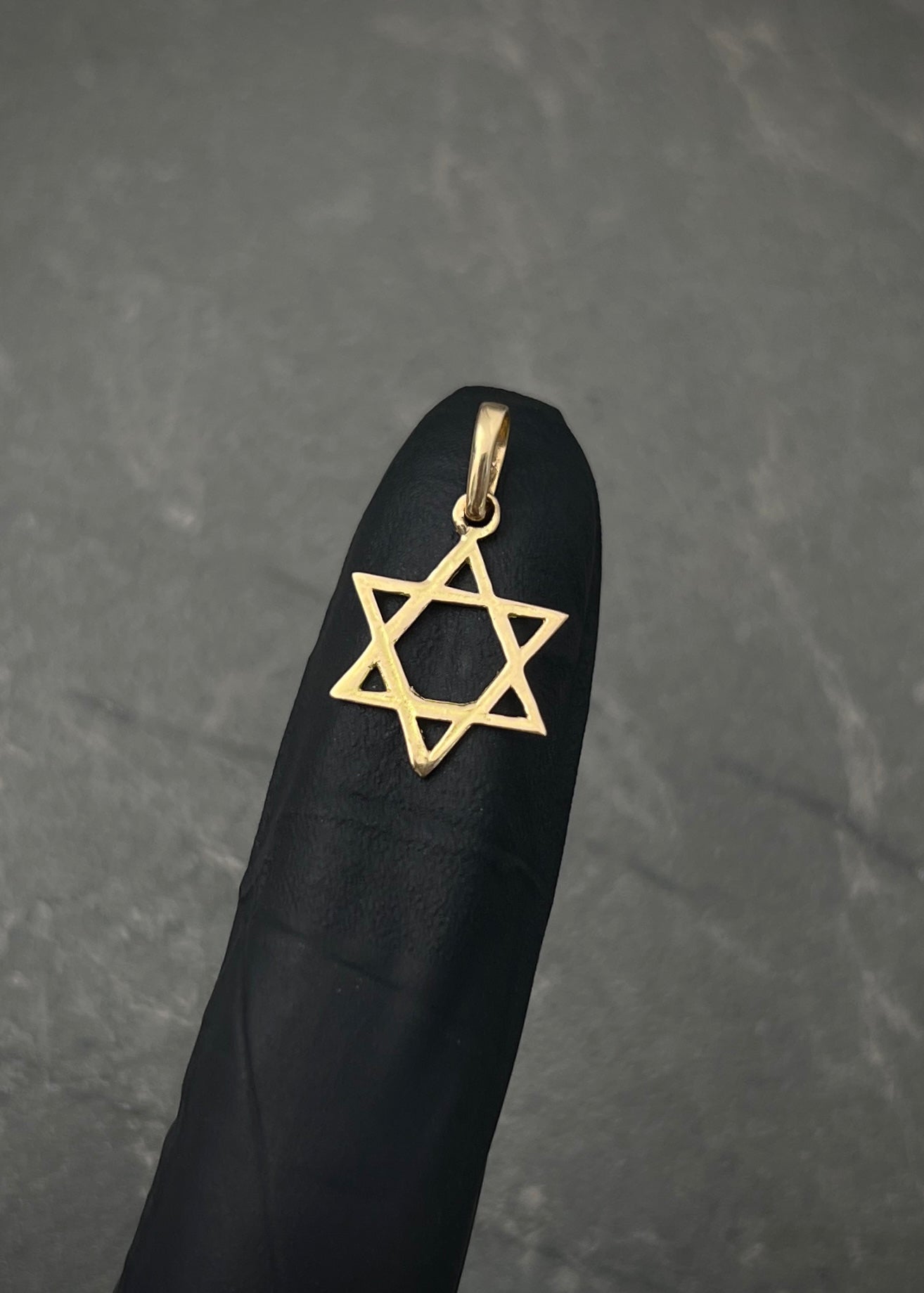 Dije estrella de david 0.65gr / Largo 2.1cm / Oro Amarillo Nac P