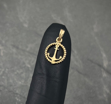 Dije ancla 0.6gr / Largo 1.6cm / Oro Amarillo Nac P
