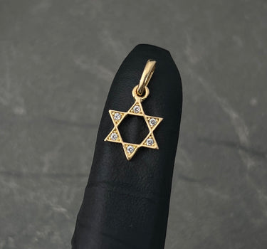 Dije estrella de david con swarovski blanco 0.65gr / Largo 1.7cm / Oro Amarillo Nac B