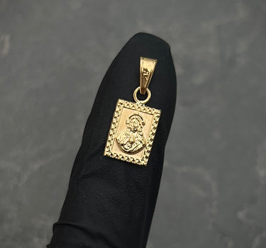 Dije corazon de jesus y virgen del carmen 0.5gr / Largo 1.8cm / Oro Amarillo Nac B