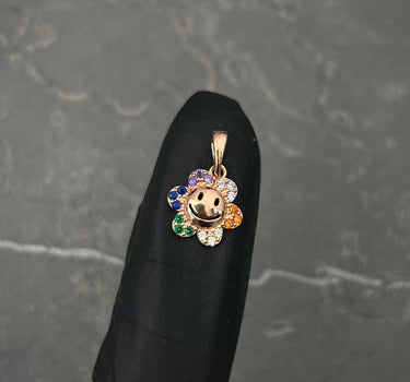 Dije flor con swarovski multicolor 0.95gr / Largo 1.6cm / Oro Rosado Nac M