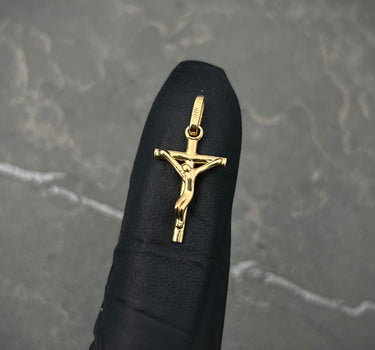 Dije cruz con cristo 0.7gr / Largo 2cm / Oro Amarillo Nac*