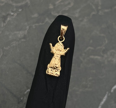 Dije del divino niño 0.5gr / Largo 2.1cm / Oro Amarillo Nac P