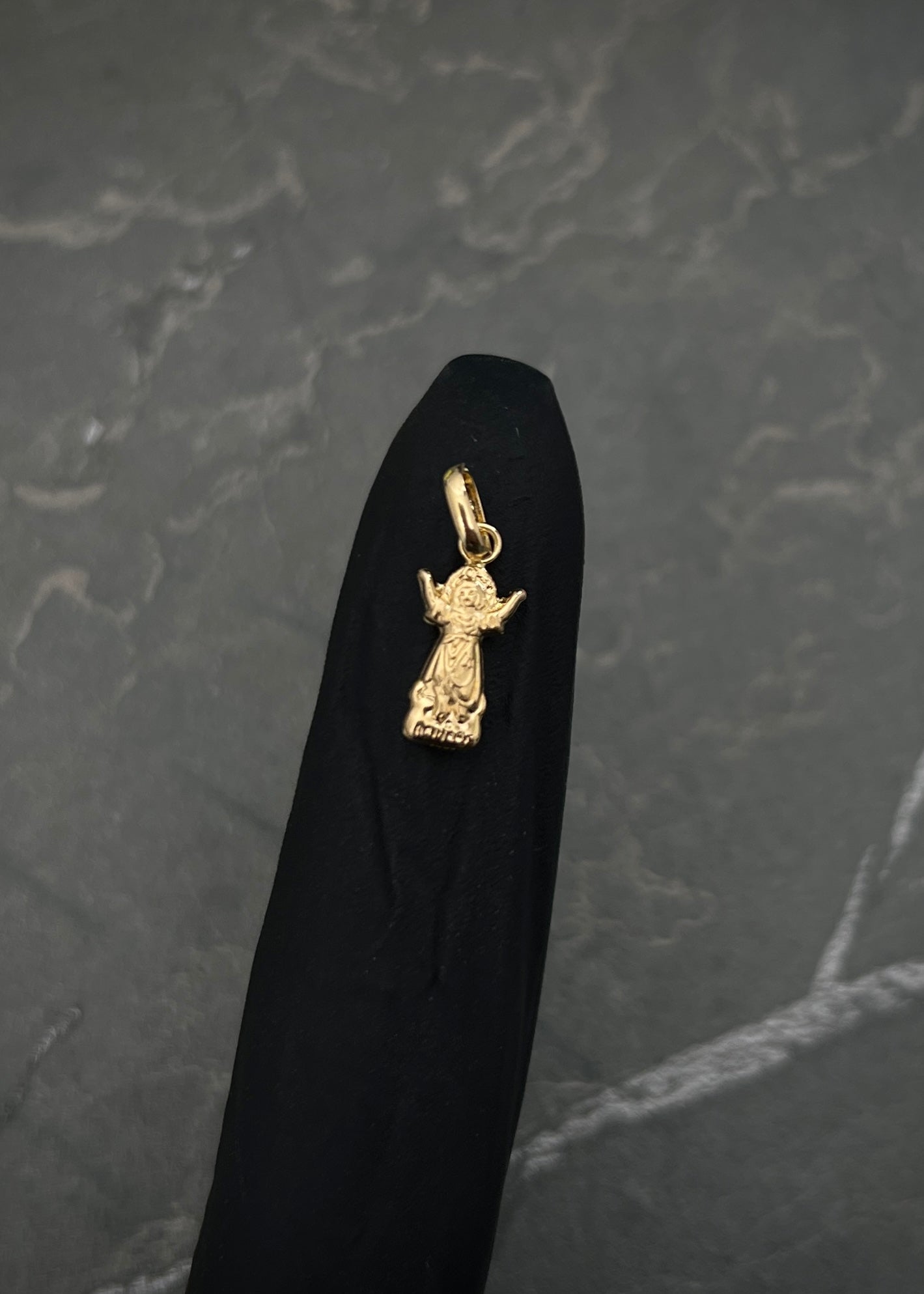 Dije divino niño 0.35gr / Largo 1.7cm / Oro Amarillo Nac B