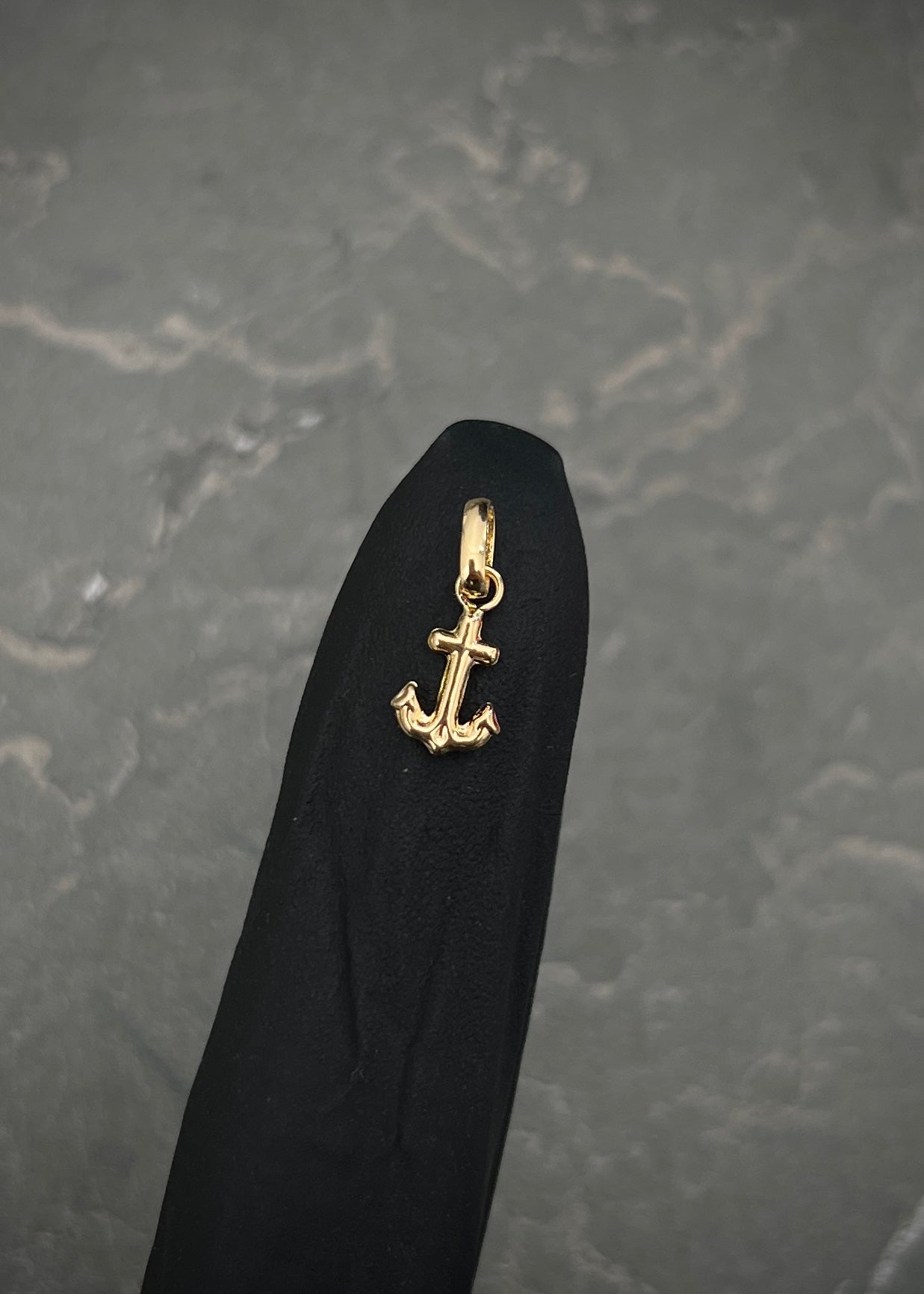 Dije ancla 0.25gr / Largo 1.3cm / Oro Amarillo Nac B