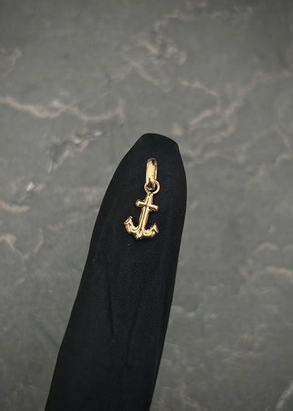 Dije ancla 0.25gr / Largo 1.3cm / Oro Amarillo Nac B