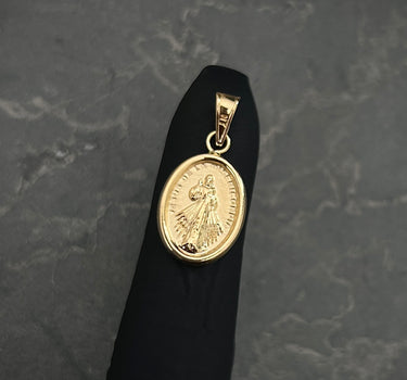 Dije jesus de la misericordia 0.6gr / Largo 1.9cm / Oro Amarillo Nac P