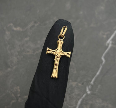 Dije cruz con cristo 0.55gr / Largo 2.5cm / Oro Amarillo Nac B