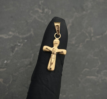 Dije cruz con cristo 0.35gr / Largo 2.1cm / Oro Amarillo Nac B