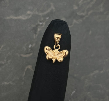 Dije mariposa 0.4gr / Largo 1.3cm / Oro Amarillo Nac M