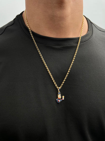 Dije tio rico con swarovski azul 3.45gr / Largo 3cm / Oro Amarillo Nac M