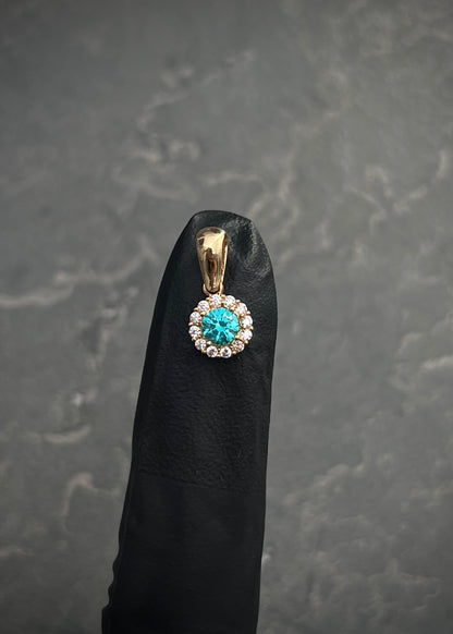 Dije flor con swarovski azul y blanco 0.9gr / Largo 1.4cm / Oro Amarillo Nac B