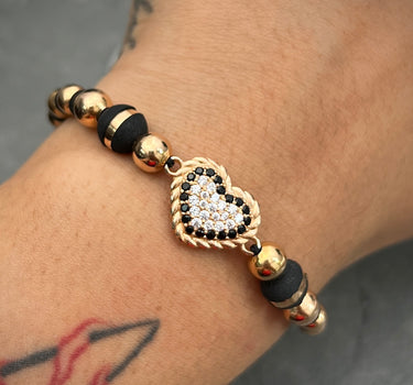 Pulsera de hilo negro con herraje de corazon con swarovski blanco y negro y bolas lisas 4gr / Oro Rosado (Joya) M