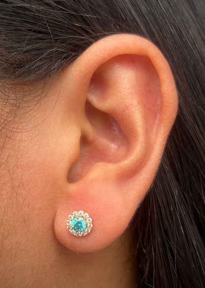 Topos flor con swarovski blanco y azul 2.2gr / Largo 0.7cm / Oro Amarillo Nac P