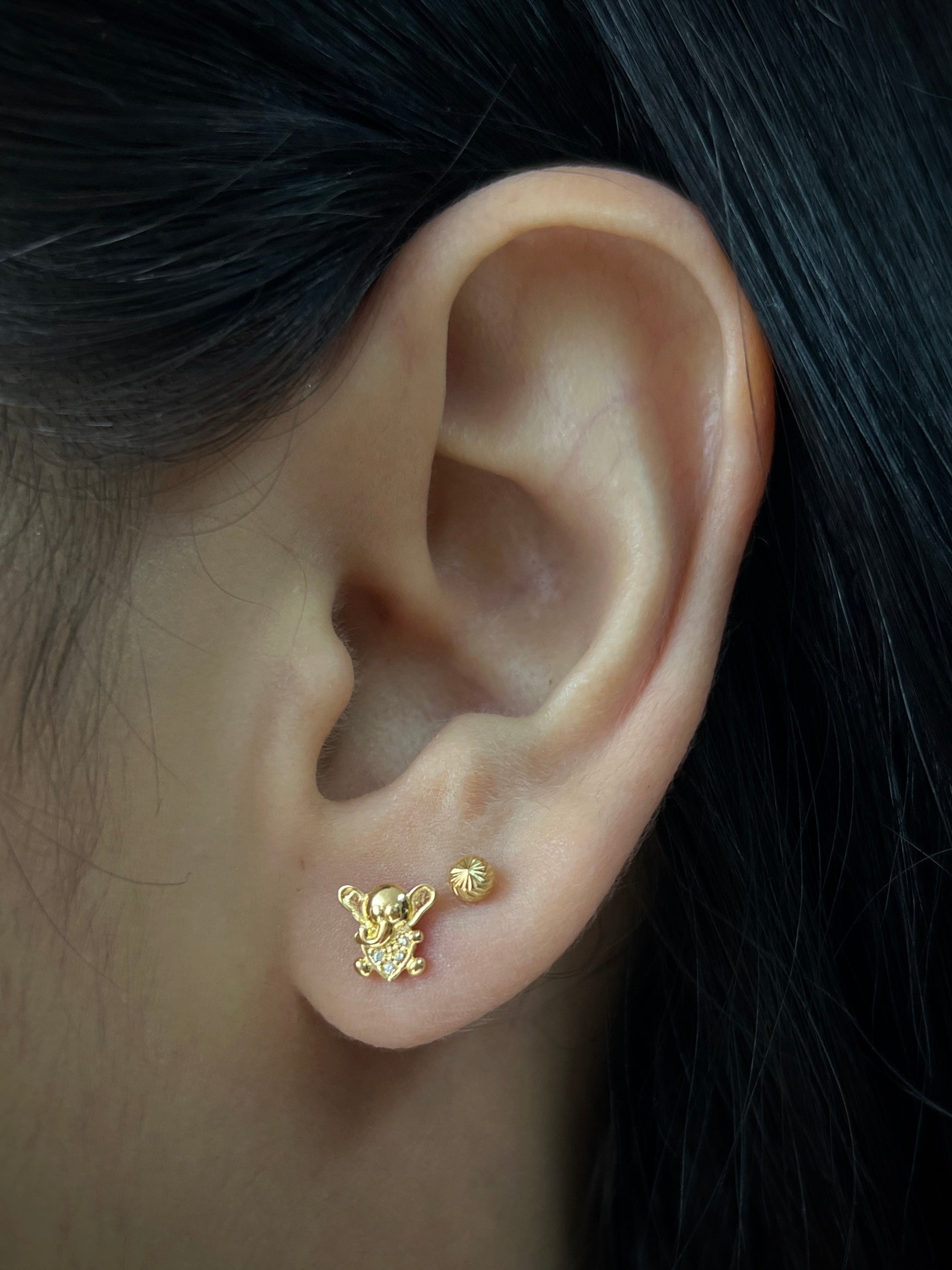 Topos de elefante con swarovski blanco 1gr / Largo 1 cm / Oro Amarillo Nac B