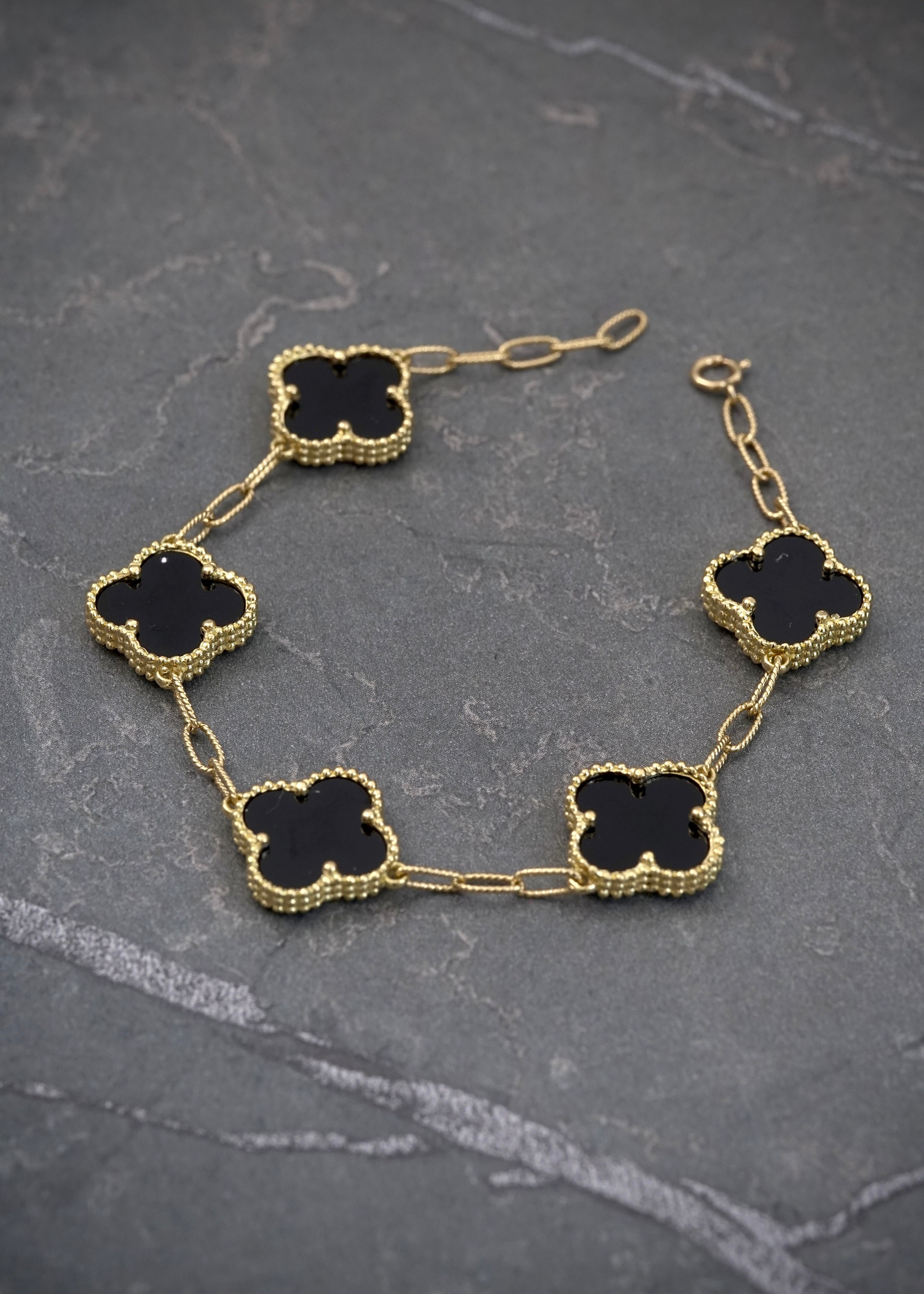 Pulso aro seguido lucky clover negro 8.8gr / Largo 16.5cm / Oro Amarillo italy cte P