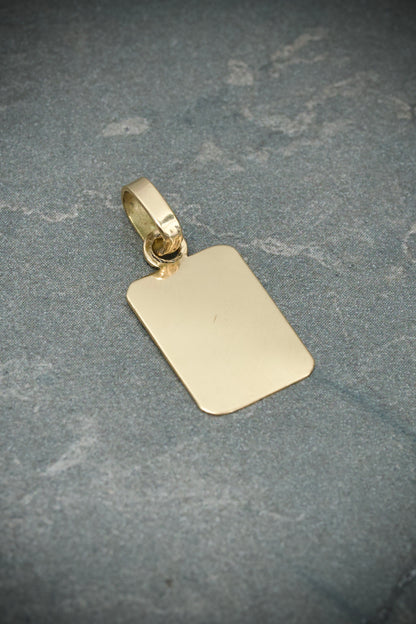 Dije placa lisa 0.85gr / Largo 2.1cm / Oro Amarillo Nac M