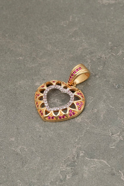 Dije corazon con swarovski fucsia y rosado 3.7gr / Largo 2.6cm — Oro Amarillo