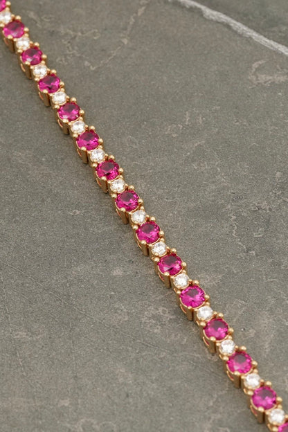 Pulso tenis con swarovski fucsia y blanco 19.35gr / Largo 17.5cm / Oro Amarillo Nac M