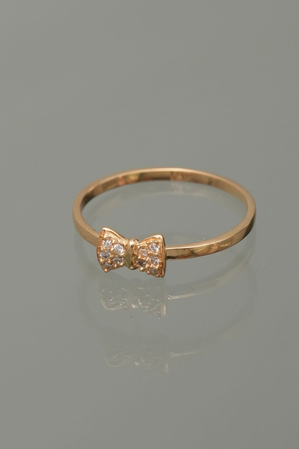 Anillo moño con swarovski blanco 1.25gr / TALLA 6 / Oro Amarillo Nac B