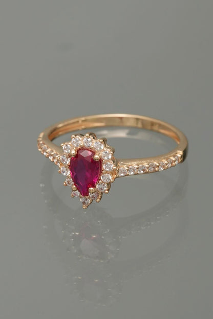 Solitario gota con swarovski fucsia y blanco 2.4gr / TALLA 6 1/2 / Oro Amarillo Nac P