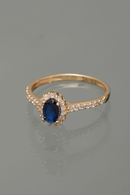 Solitario con swarovski azul y blanco 2.2gr / Talla 7 — Oro Amarillo