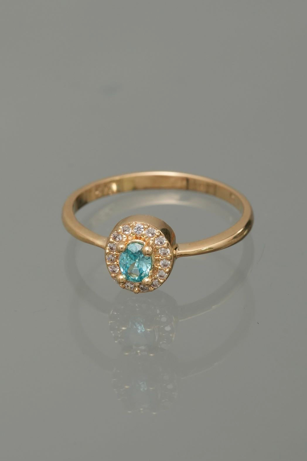 Solitario con swarovski azul y blanco 2.05gr / TALLA 6 1/2 / Oro Amarillo Nac*