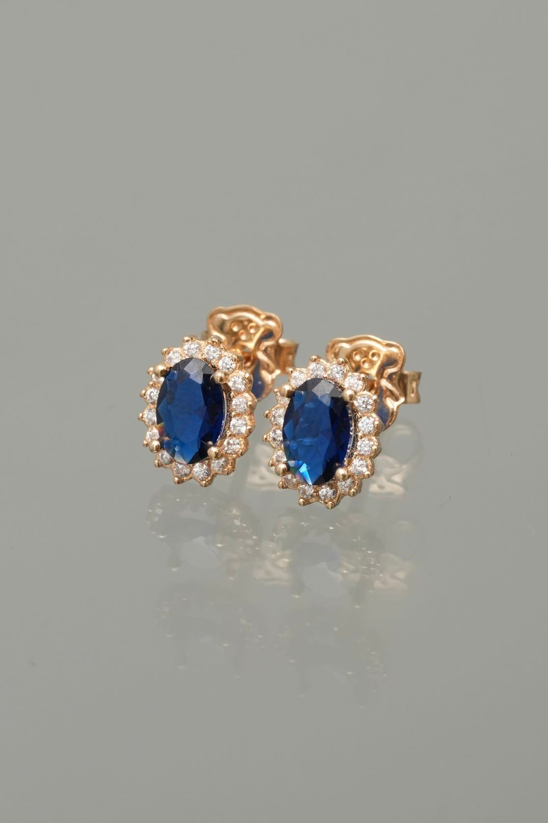 Topos con swarovski azul y blanco 1.45gr / Largo 0.8cm — Oro Amarillo
